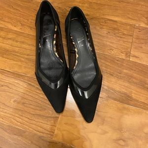 Classic black pointed flats.